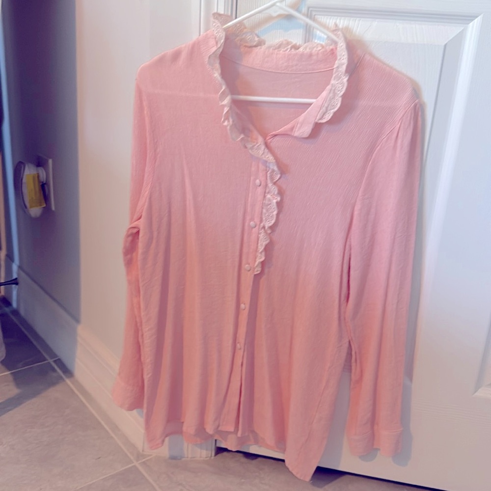 Pretty in pink long sleeve shirt. Polyester/spandex combination EYELET trim.